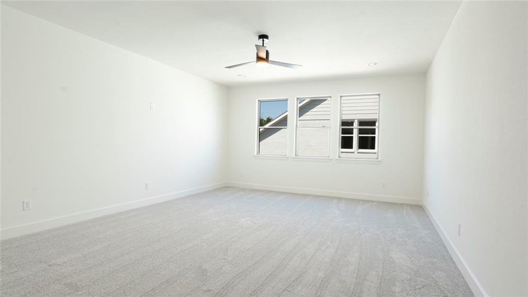 Unfurnished living room featuring recessed lighting, a brick fireplace, light wood-style floors, a ceiling fan, and built in features Unfurnished living room featuring recessed lighting, a brick fireplace, light wood-style floors, a ceiling fan, and built in features