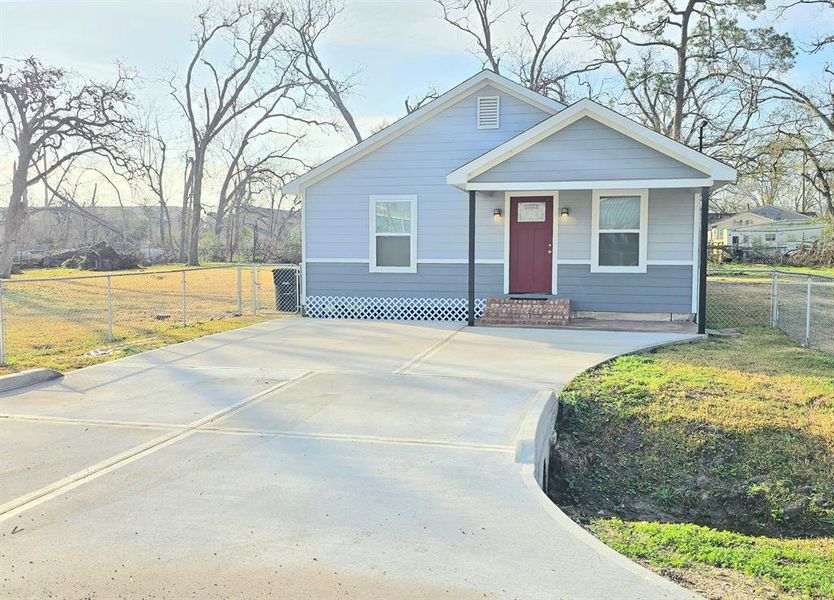 Home features a long driveway, great for family and guests.