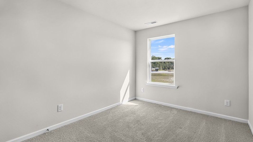 Spacious, unfurnished interior of a new home in Edinborough Townes, Gibsonville (Image 14).