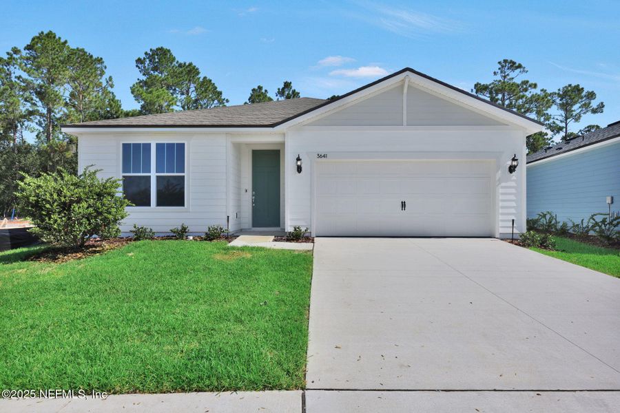 Front exterior of a new home in Hyland Trail, Green Cove Springs, FL, highlighting curb appeal (Image 1). Front exterior of a new home in Hyland Trail, Green Cove Springs, FL, highlighting curb appeal (Image 1).