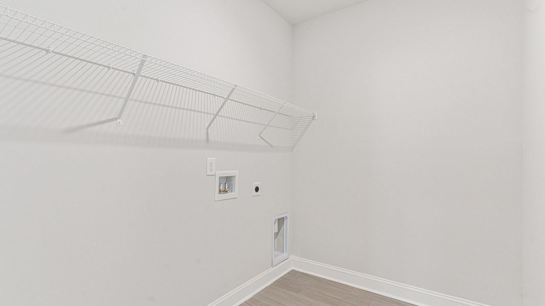 Spacious, unfurnished interior of a new home in Cedar Hill Landing, Navassa (Image 31).