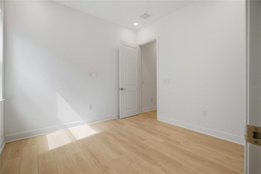 Spacious, unfurnished interior of a new home in Bella Collina, Montverde (Image 43).