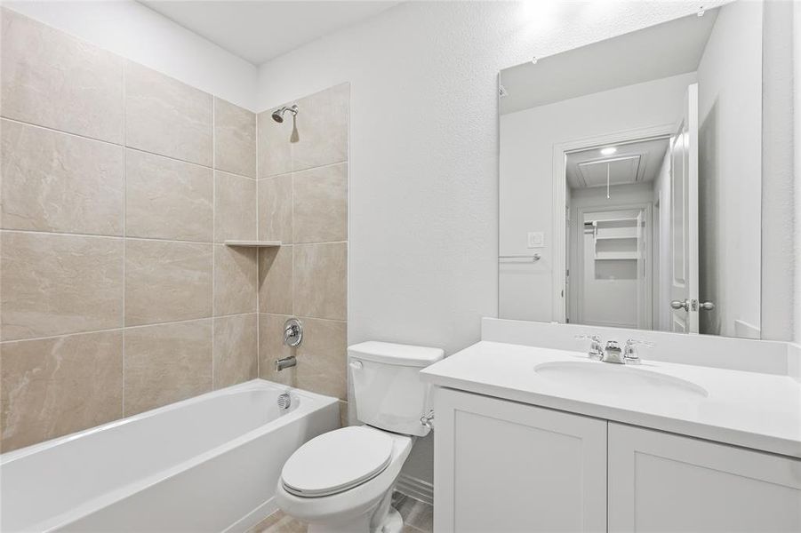Full bathroom featuring shower / washtub combination and vanity