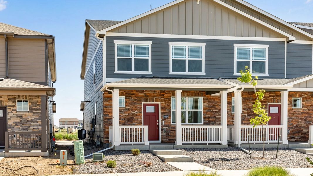 Front exterior of a new home in Villas at Vantage, Berthoud, CO, highlighting curb appeal (Image 1). Front exterior of a new home in Villas at Vantage, Berthoud, CO, highlighting curb appeal (Image 1).