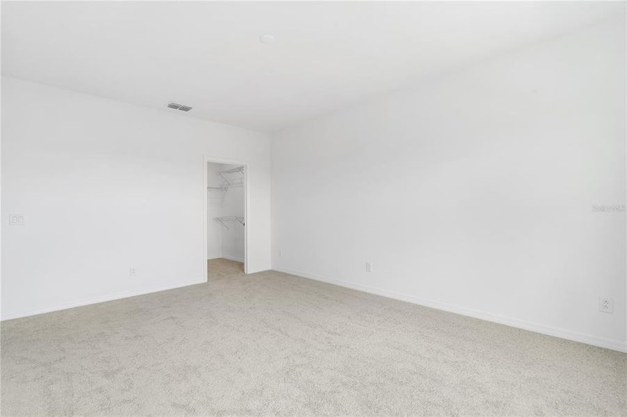 Spacious, unfurnished interior of a new home in Osprey Ranch Townhomes, Winter Garden (Image 27).