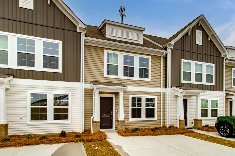 Front exterior of a new home in Astoria, Columbia, SC, highlighting curb appeal (Image 2). Front exterior of a new home in Astoria, Columbia, SC, highlighting curb appeal (Image 2).