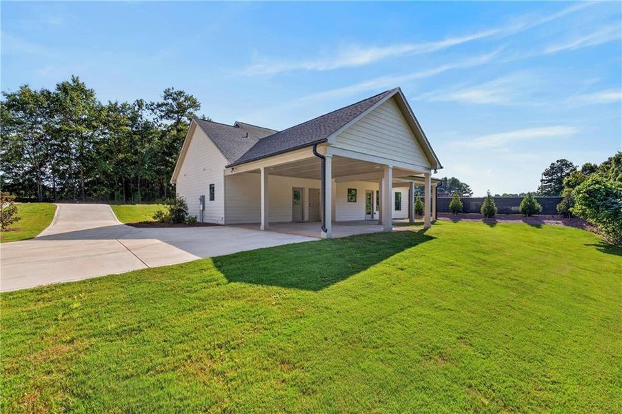 Front exterior of a new home in , Monroe, GA, highlighting curb appeal (Image 22).