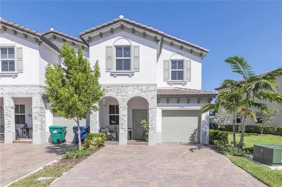 Front exterior of a new home in , Miami, FL, highlighting curb appeal (Image 22).