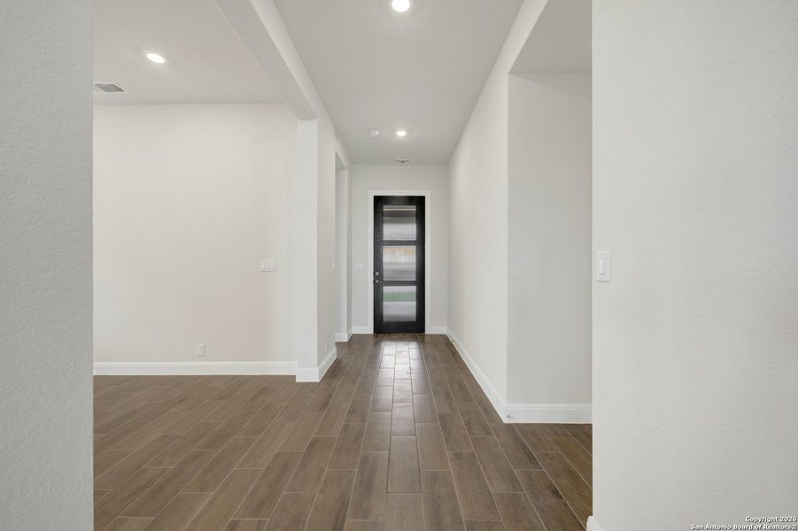 Spacious, unfurnished interior of a new home in Windsong - Reserve Series, Boerne (Image 58).