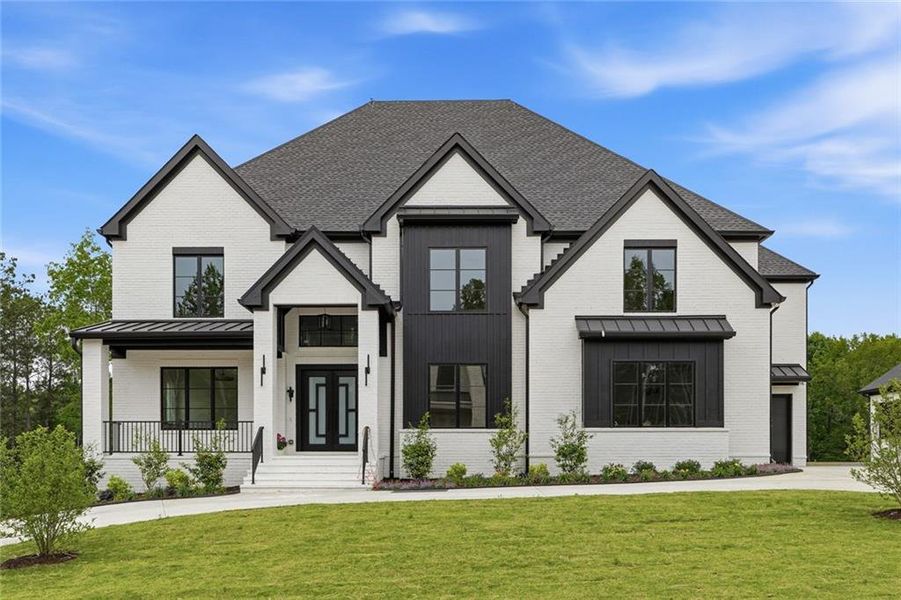 Front exterior of a new home in , Cumming, GA, highlighting curb appeal (Image 2). Front exterior of a new home in , Cumming, GA, highlighting curb appeal (Image 2).
