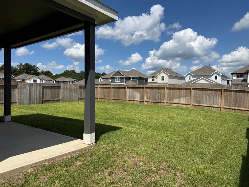 Exterior details and patio area of a home in River's Edge, Conroe (Image 3). Exterior details and patio area of a home in River's Edge, Conroe (Image 3).