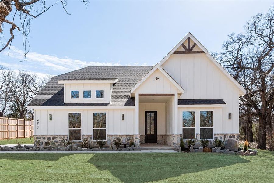 Front exterior of a new home in , Azle, TX, highlighting curb appeal (Image 21). Front exterior of a new home in , Azle, TX, highlighting curb appeal (Image 21).