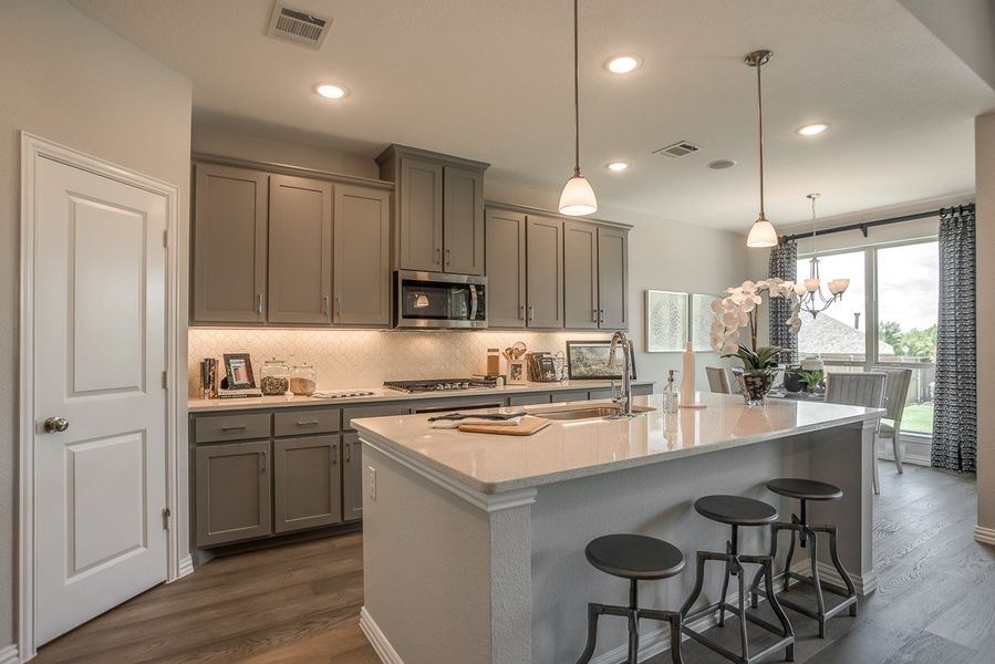 Furnished interior view inside a new home in Wildridge, Oak Point (Image 13).