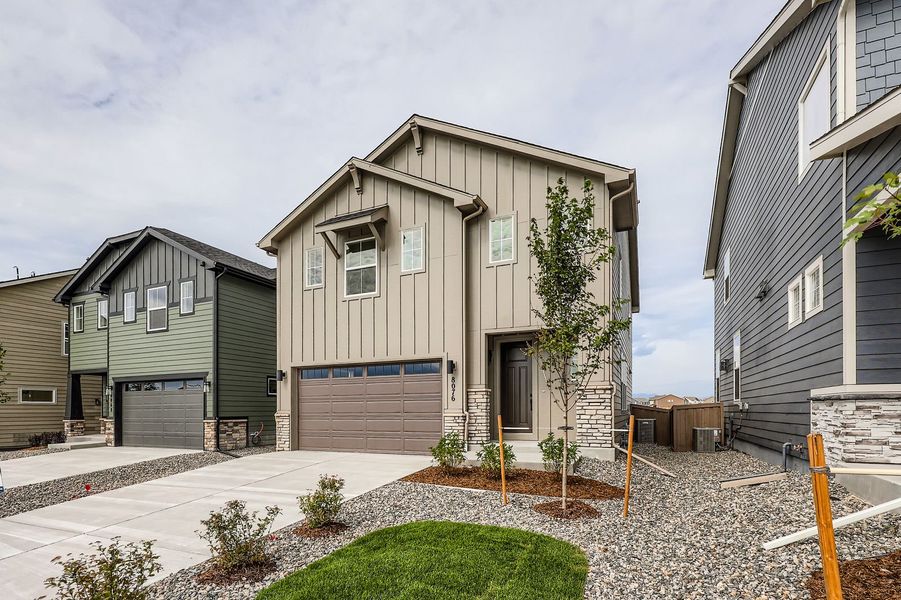 Front exterior of a new home in Sterling Ranch 40s, Colorado Springs, CO, highlighting curb appeal (Image 19).