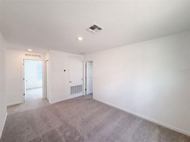 Spacious, unfurnished interior of a new home in Ranches at Lake Mcleod, Eagle Lake (Image 13).