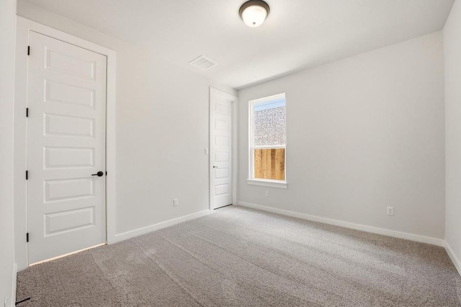 Spacious, unfurnished interior of a new home in Heritage, Dripping Springs (Image 27).