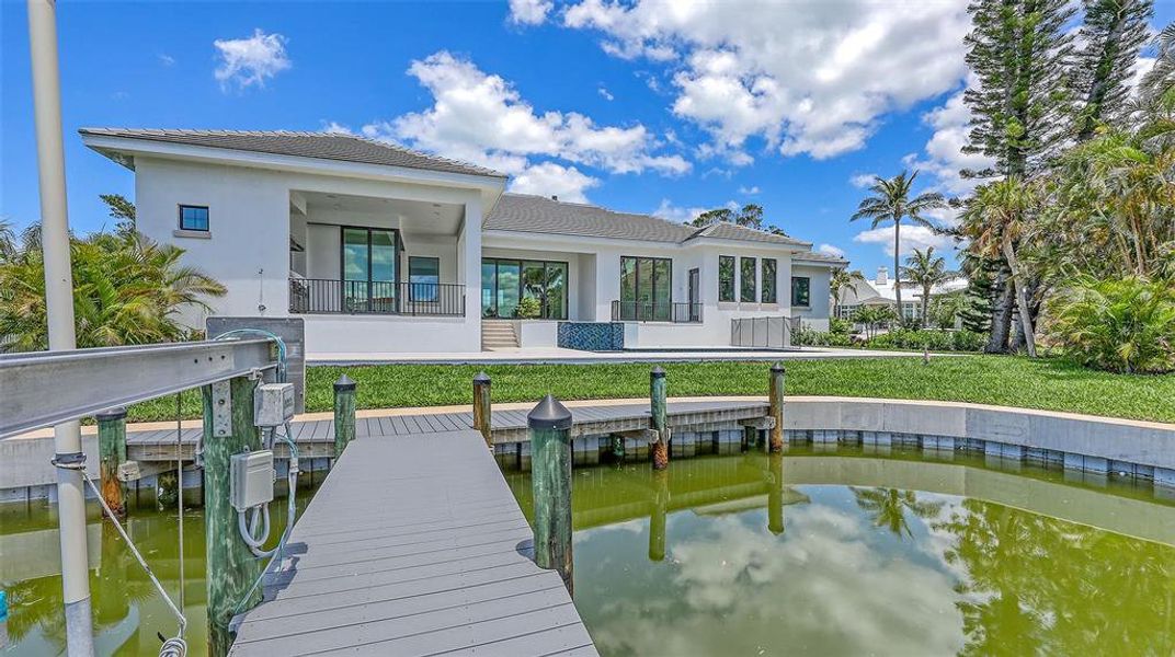 Front exterior of a new home in , Longboat Key, FL, highlighting curb appeal (Image 25).