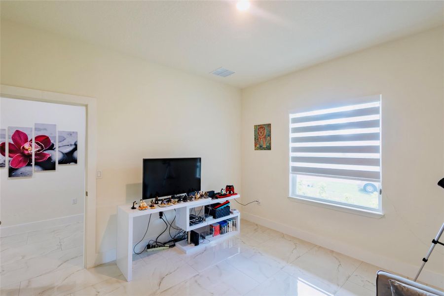 Furnished interior view inside a new home in , Port St. Lucie (Image 24).