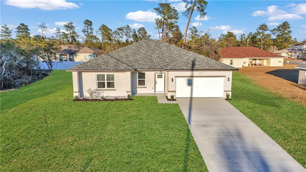 Front exterior of a new home in , Ocala, FL, highlighting curb appeal (Image 21).