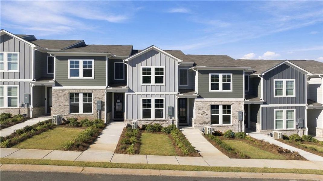 Front exterior of a new home in Stegall Village, Emerson, GA, highlighting curb appeal (Image 17).