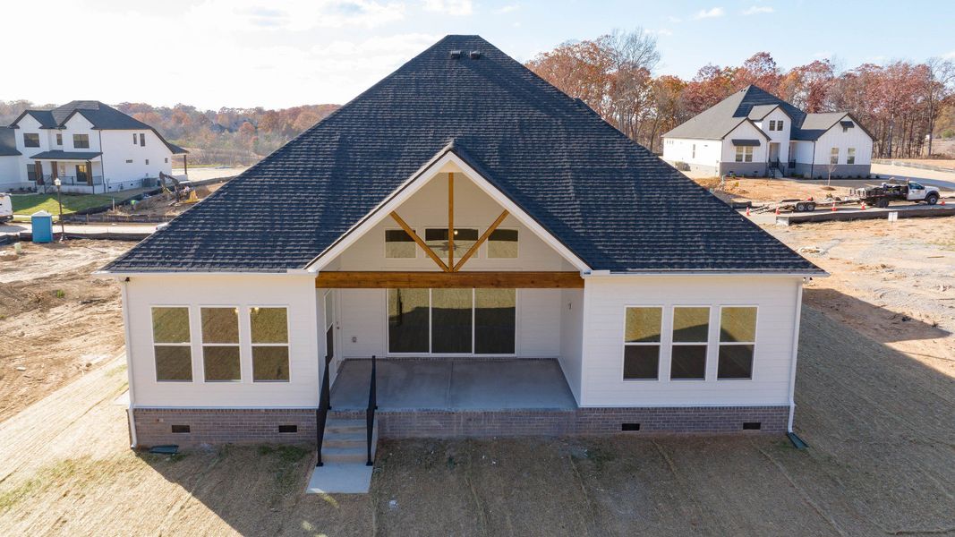 Rear of home with covered back patio