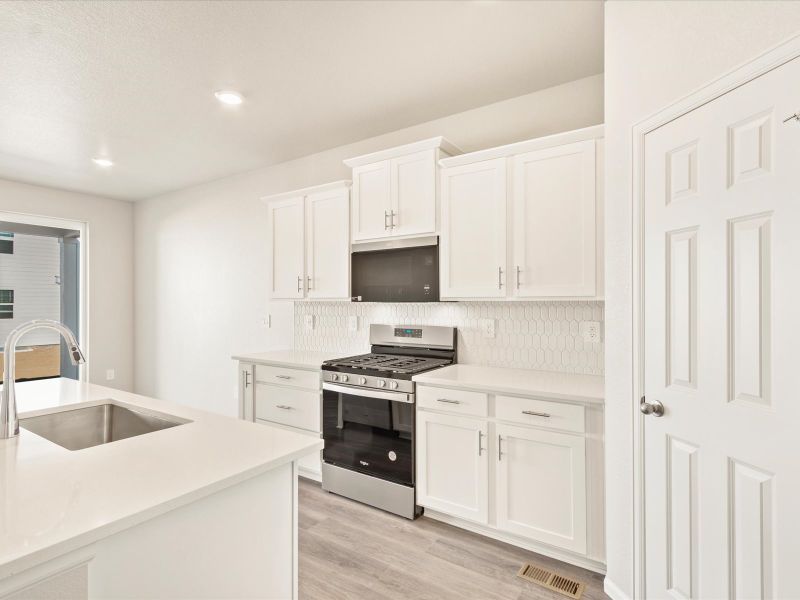 The Cherry Creek floorplan interior image taken at a Meritage Homes community in Northern Colorado.