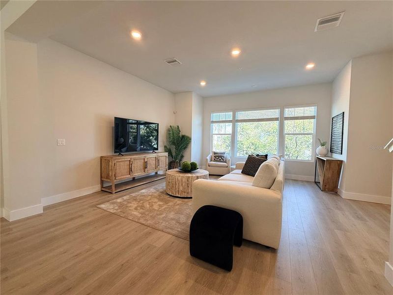 Furnished interior view inside a new home in Towns at Union, St. Petersburg (Image 3).