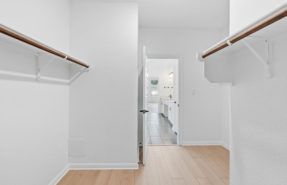 Spacious, unfurnished interior of a new home in West Cypress Hills, Spicewood (Image 54).