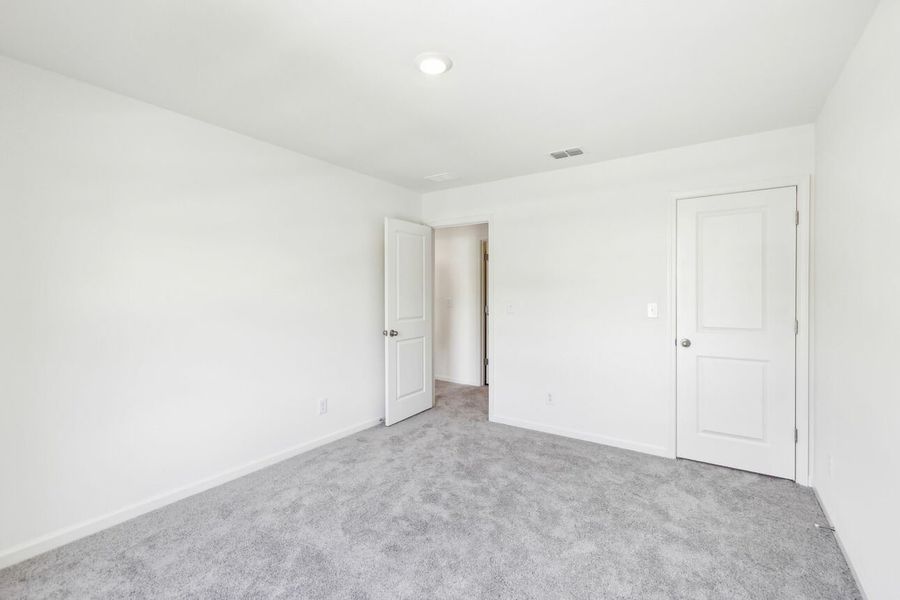 Representative unfurnished interior of a home built from the Galileo by Starlight Homes in Harrington Trails at The Canopies, New Caney (Image 37).
