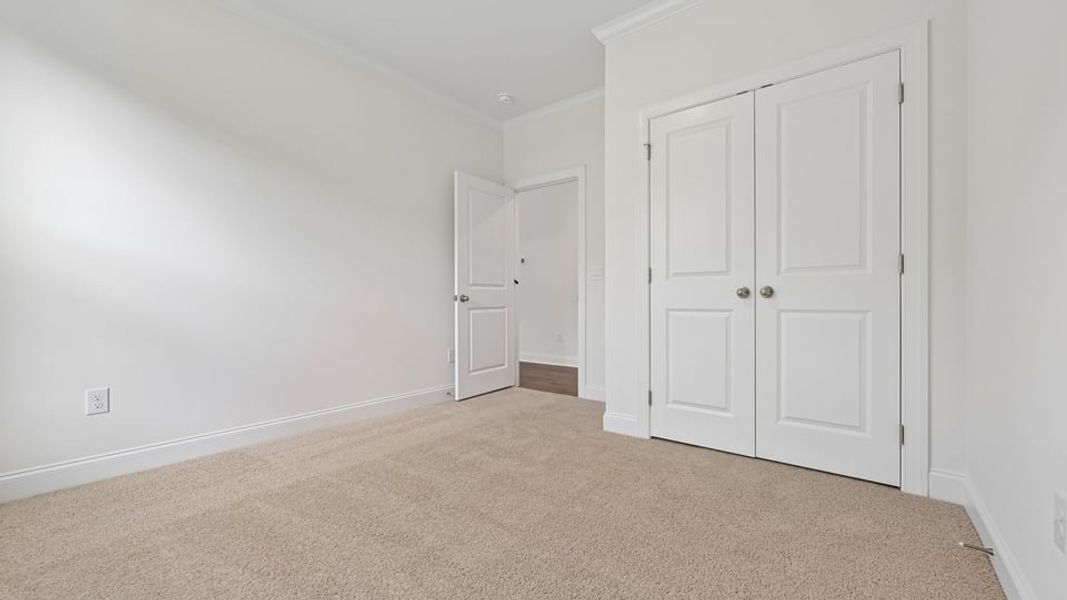 Spacious, unfurnished interior of a new home in The Estates Park, Apex (Image 24).