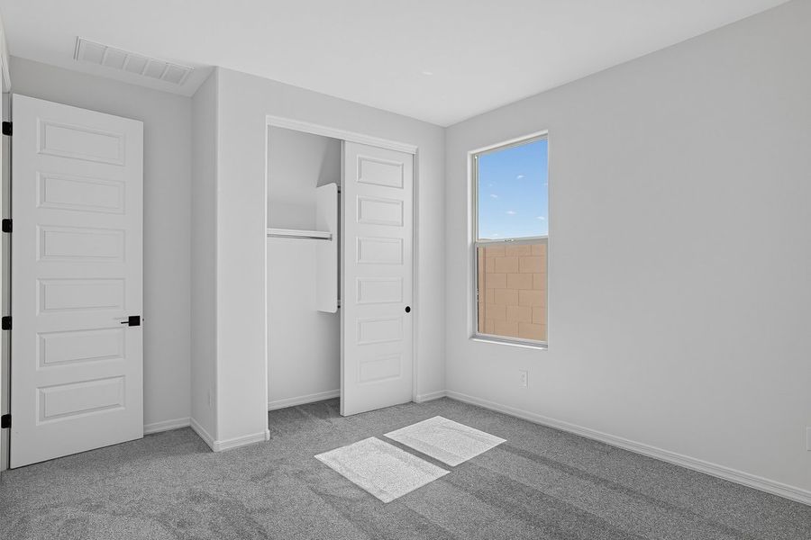 Spacious, unfurnished interior of a new home in Artisan at Asante, Surprise (Image 15).