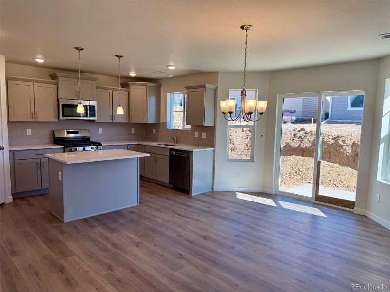Furnished interior view inside a new home in Sky Ranch - Highland Collection, Watkins (Image 3).