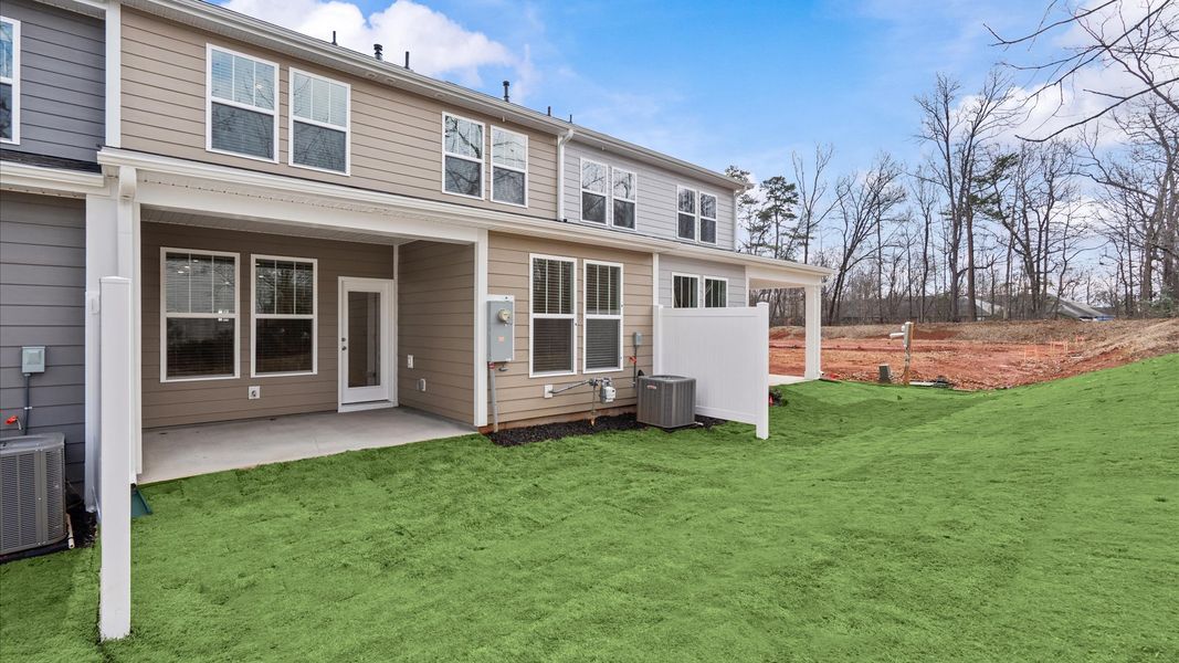 Exterior details and patio area of a home in Pelham Crossing, Greenville (Image 4).