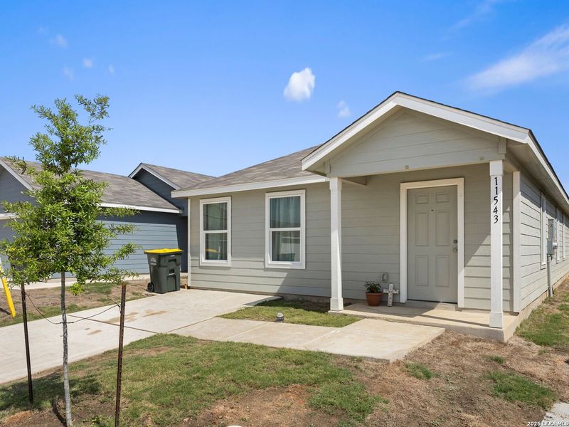 Exterior details and patio area of a home in Rose Valley, Converse (Image 30).