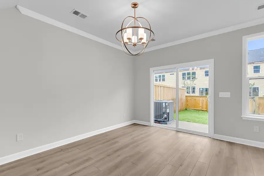 Spacious, unfurnished interior of a new home in Pineland Preserve, Summerville (Image 24).