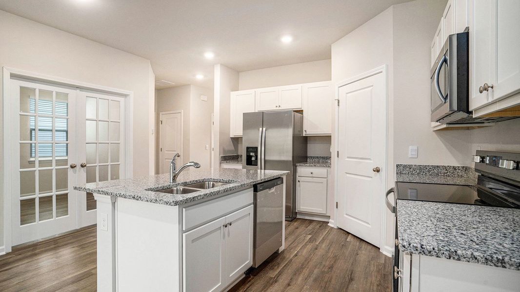 Furnished interior view inside a new home in Rich Square at Brunswick Plantation, Ash (Image 4). Furnished interior view inside a new home in Rich Square at Brunswick Plantation, Ash (Image 4).