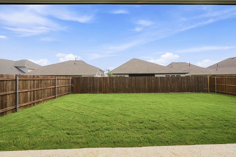 Exterior details and patio area of a home in Tavolo Park, Fort Worth (Image 3).