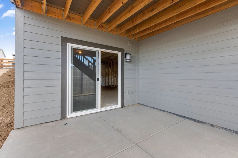 Exterior details and patio area of a home in The Manors Collection at Golden Overlook, Golden (Image 3).