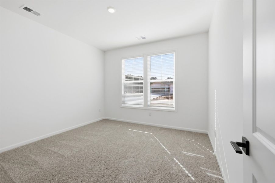 Spacious, unfurnished interior of a new home in Westwood Reserve, Conway (Image 27).