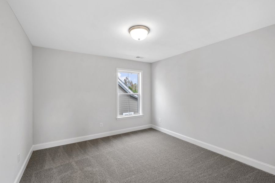 Spacious, unfurnished interior of a new home in Wildcat Chase, Summerville (Image 33).