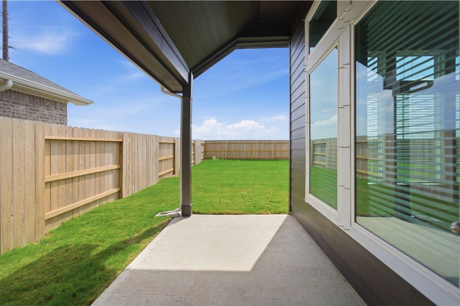 Exterior details and patio area of a home in Creekhaven, Arcola (Image 29).