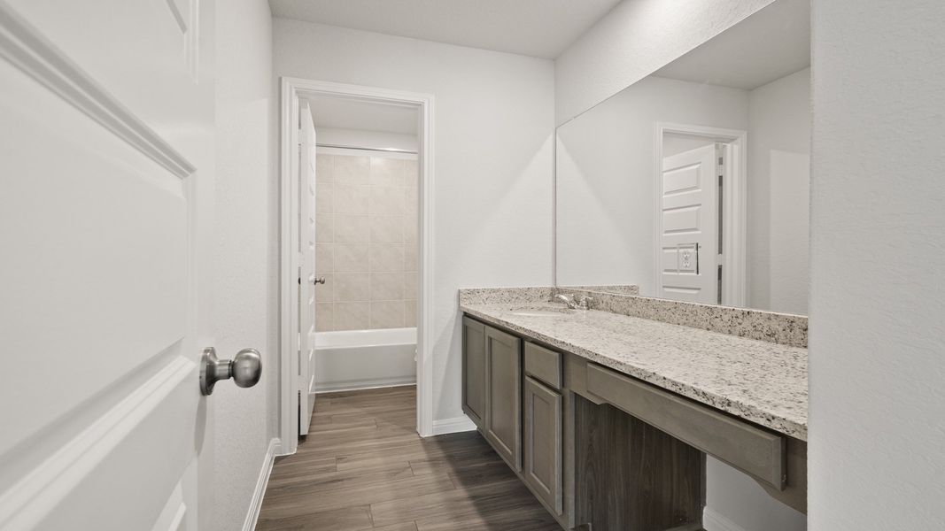 Furnished interior view inside a new home in Hunters Ranch, San Antonio (Image 10).