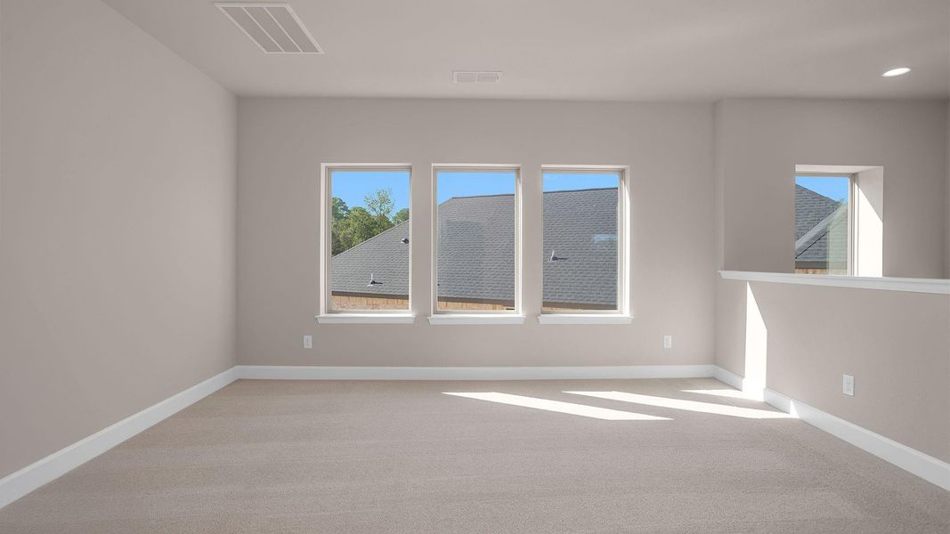 Spacious, unfurnished interior of a new home in The Woodlands Hills 40', Willis (Image 10).