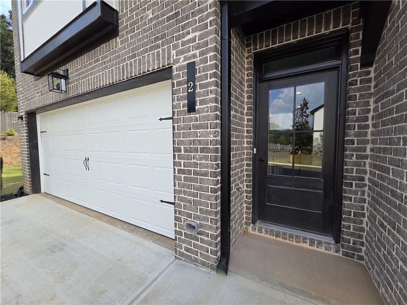 Front exterior of a new home in , Tucker, GA, highlighting curb appeal (Image 2).