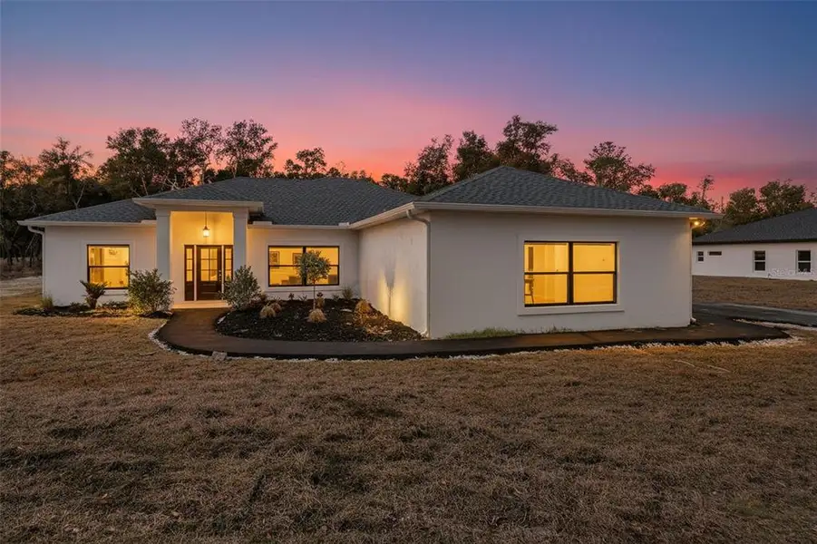 Exterior details and patio area of a home in , Webster (Image 1). Exterior details and patio area of a home in , Webster (Image 1).