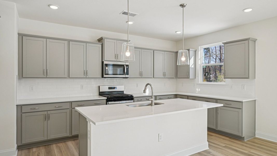 Representative furnished interior of a home built from the Wagener by DRB Homes in Station Pointe, Angier (Image 13).
