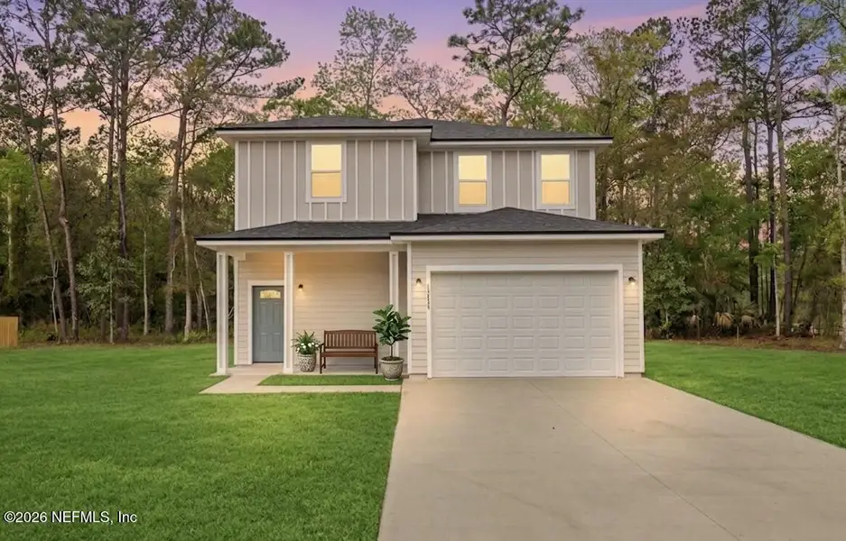 Front exterior of a new home in , Jacksonville, FL, highlighting curb appeal (Image 1). Front exterior of a new home in , Jacksonville, FL, highlighting curb appeal (Image 1).
