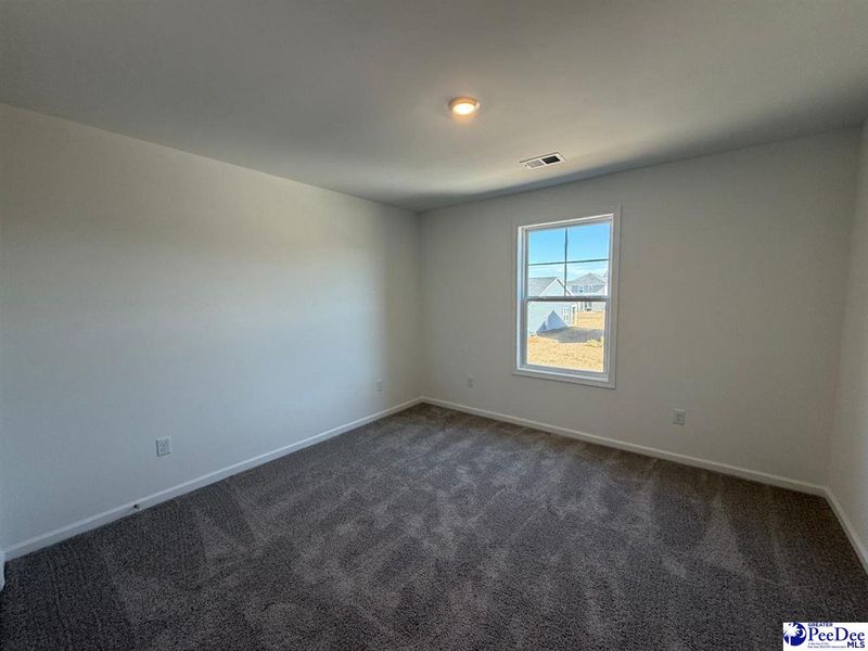 Spacious, unfurnished interior of a new home in The Grove, Florence (Image 29).