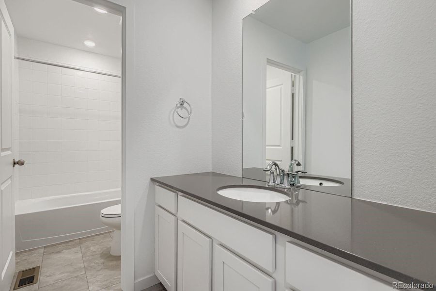 Furnished interior view inside a new home in Sky Ranch: Pioneer Collection, Watkins (Image 5).