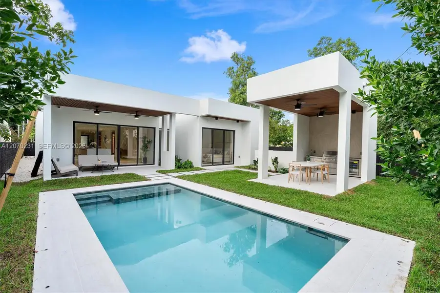 Exterior details and patio area of a home in , Miami (Image 13).
